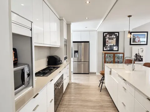 Moxie House — Downstairs kitchen with breakfast island