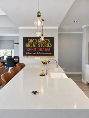 Moxie House — Kitchen island and playful welcome board