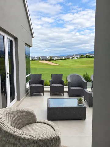Moxie House — Upper patio seating overlooking Kingswood fairways