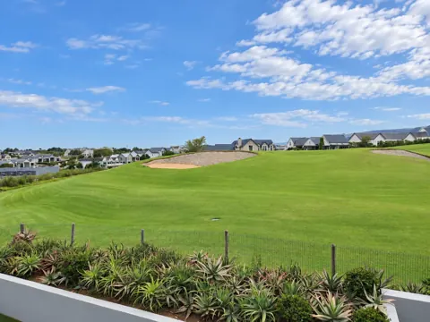 Moxie House — Kingswood fairway outlook with mountains beyond
